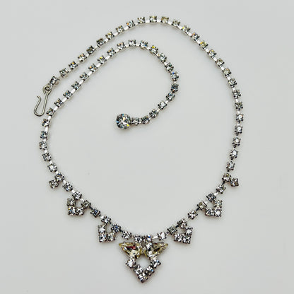 Necklace laid flat showing hook clasp and rhinestone extender