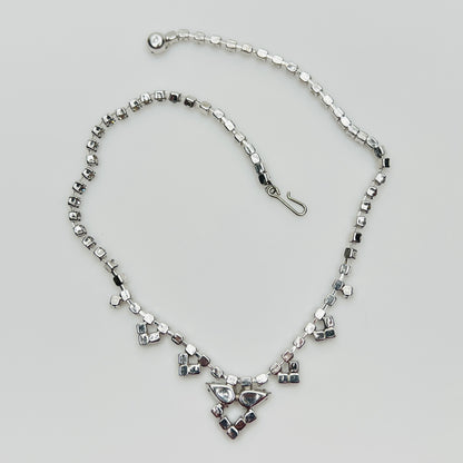 back view of Necklace laid flat showing hook clasp and rhinestone extender