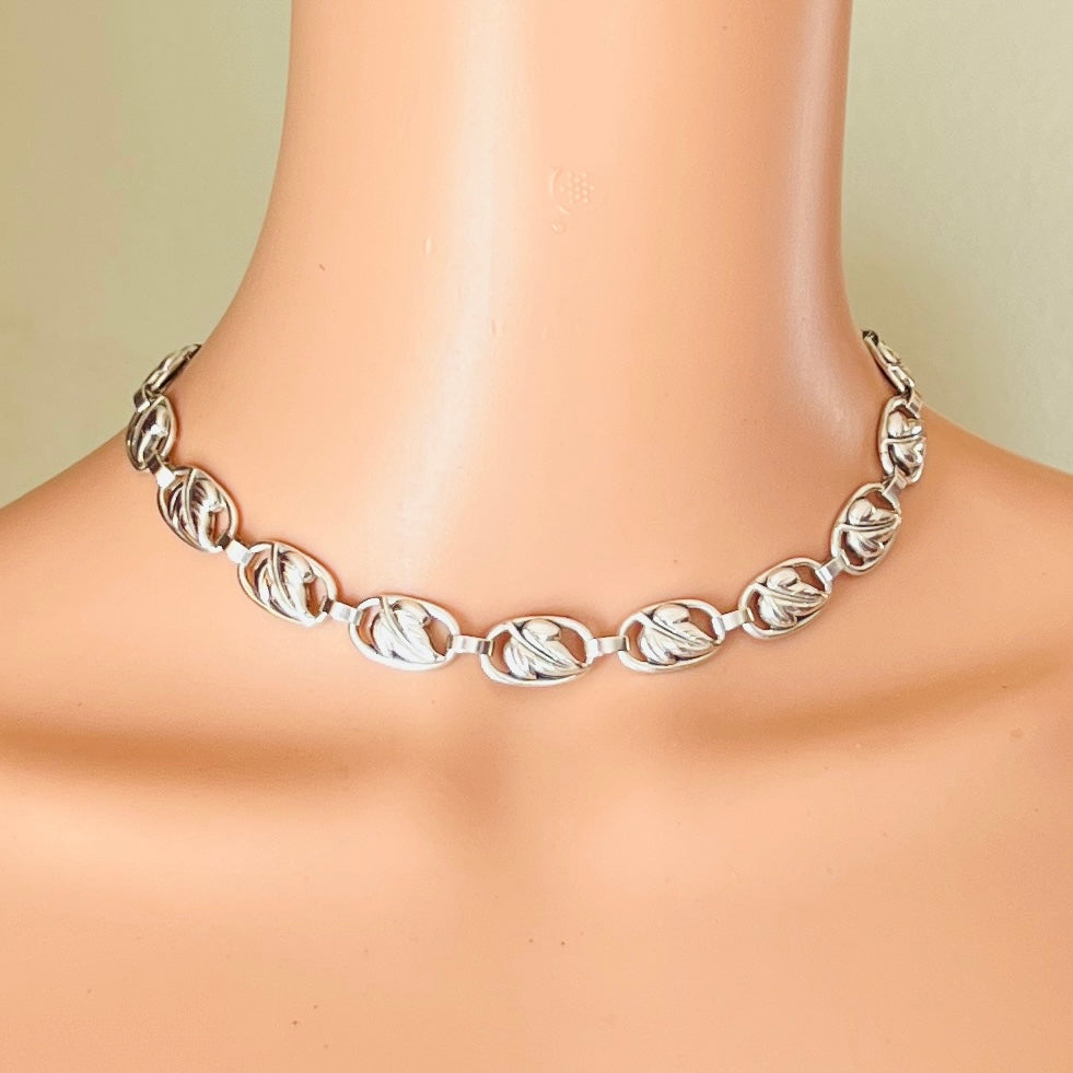 1950s silver leaf choker necklace worn on mannequin