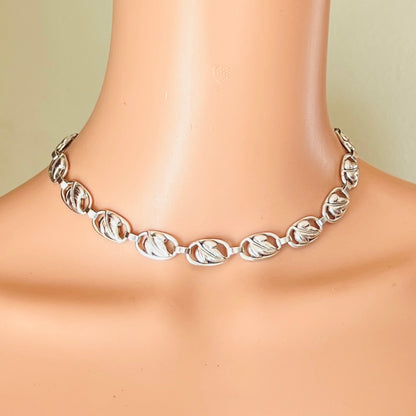 1950s silver leaf choker necklace worn on mannequin