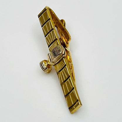 side view 1950s gold-tone tie clip with vintage microphone motif