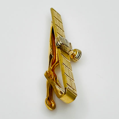 side view 1950s gold-tone tie clip with vintage microphone motif