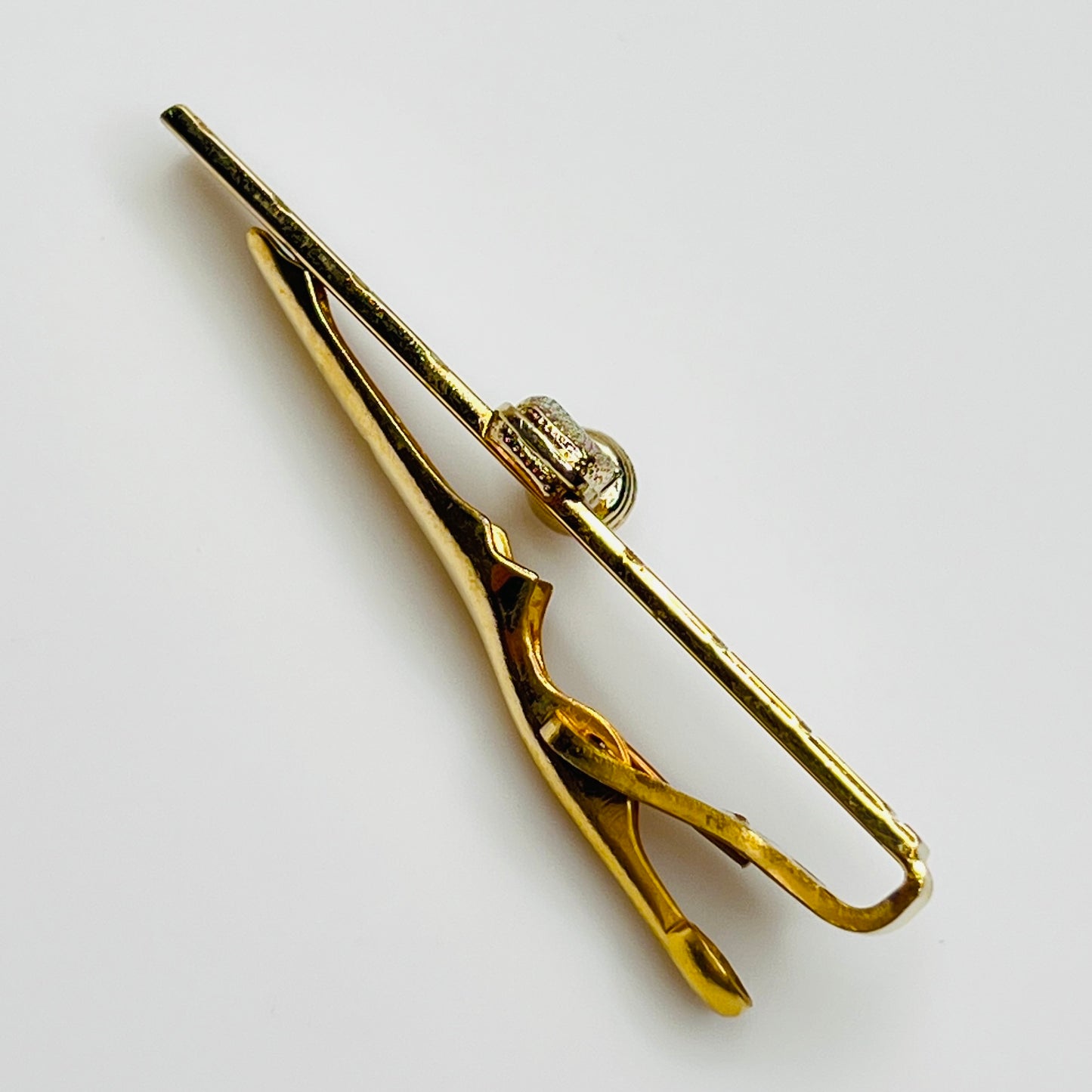 side view 1950s gold-tone tie clip with vintage microphone motif