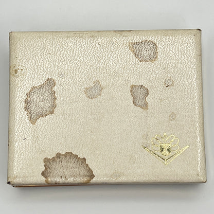 Exterior of vintage Foster box showing staining and wear