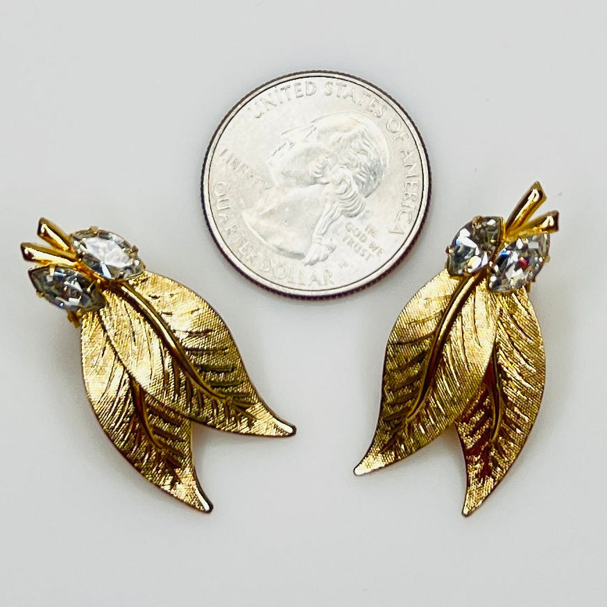 Vintage leaf clip on earrings with quarter for scale and crystal center cluster