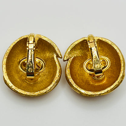 Crown Trifari gold-tone clip-on earrings with swirl design, brushed and polished finish