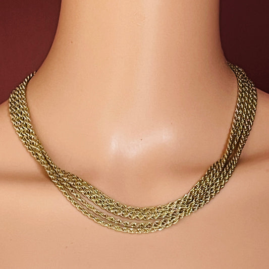 Necklace shown on model’s neck for scale and drape