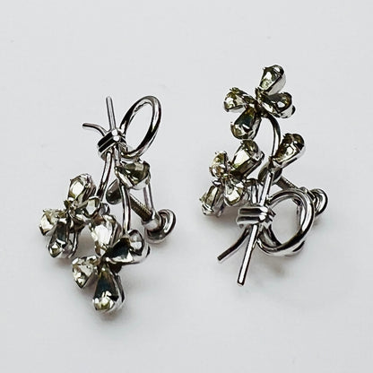 Vintage Phyllis sterling silver rhinestone flower screw back earrings