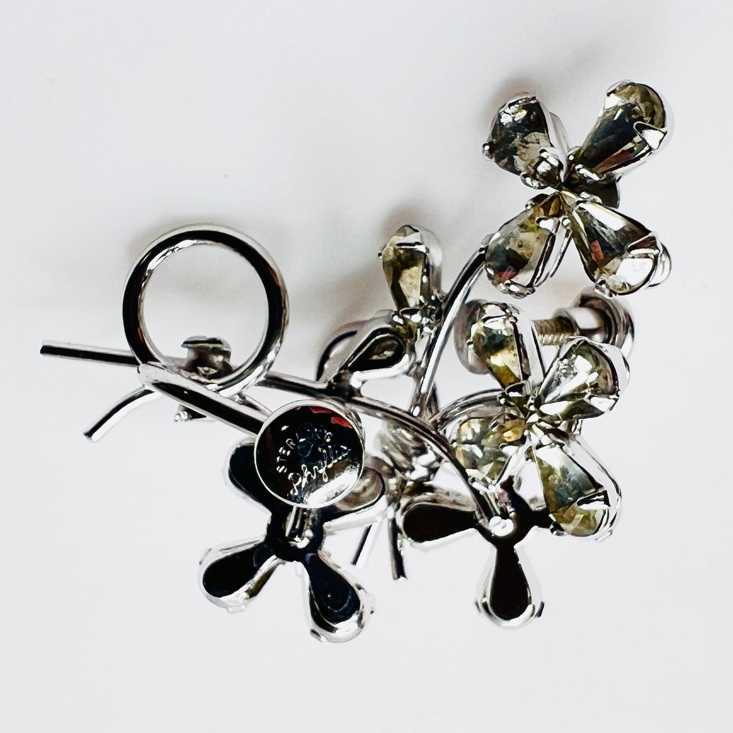 Back view signed Phyllis sterling screw back rhinestone flower earrings
