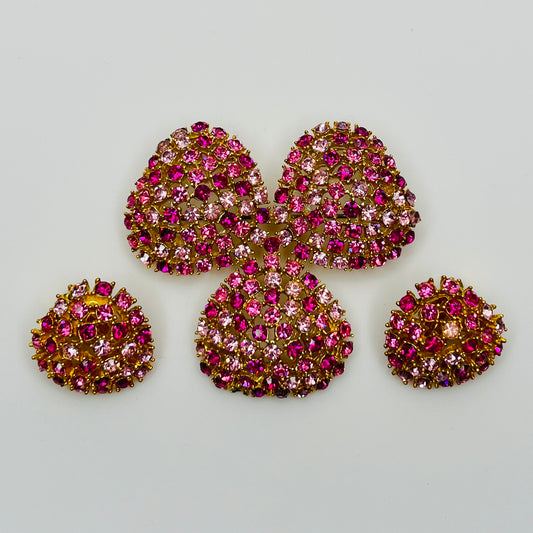 Vintage gold-tone brooch and clip-on earrings with pink rhinestones, mid-century jewelry set