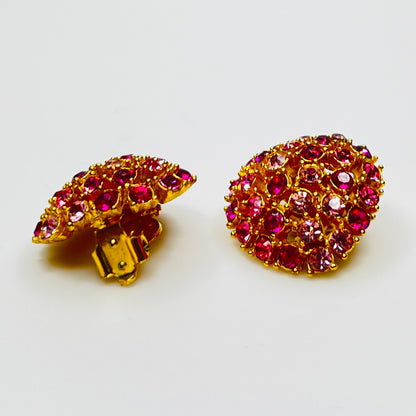 Vintage gold-tone brooch and clip-on earrings with pink rhinestones, mid-century jewelry set