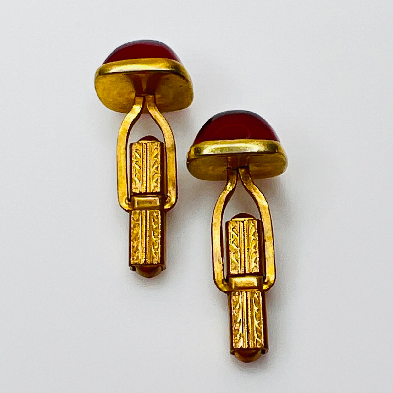 Art Deco estate cufflinks and button studs with square red lucite cabochons