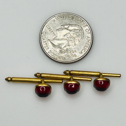 1940s ruby red lucite studs in brass