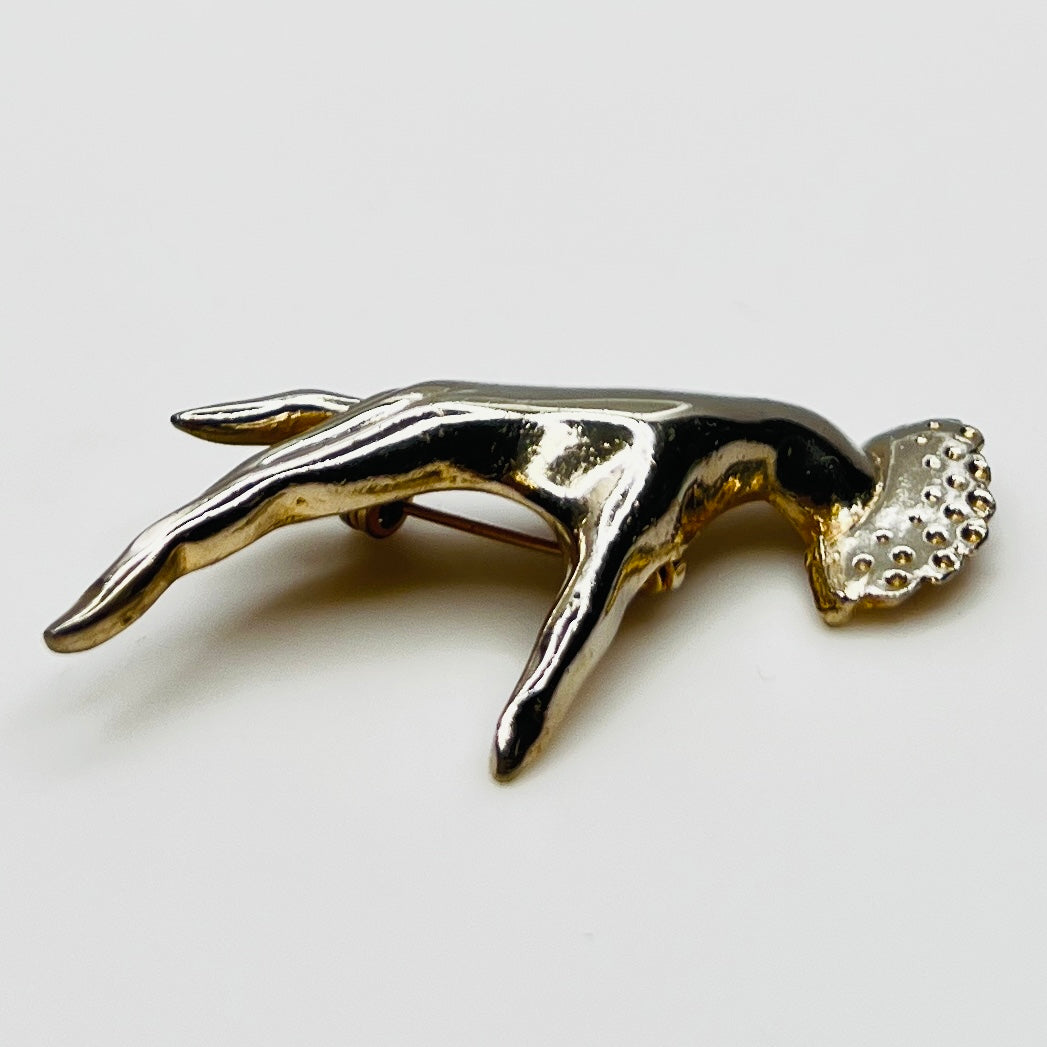 Vintage modernist hand brooch with polished finish