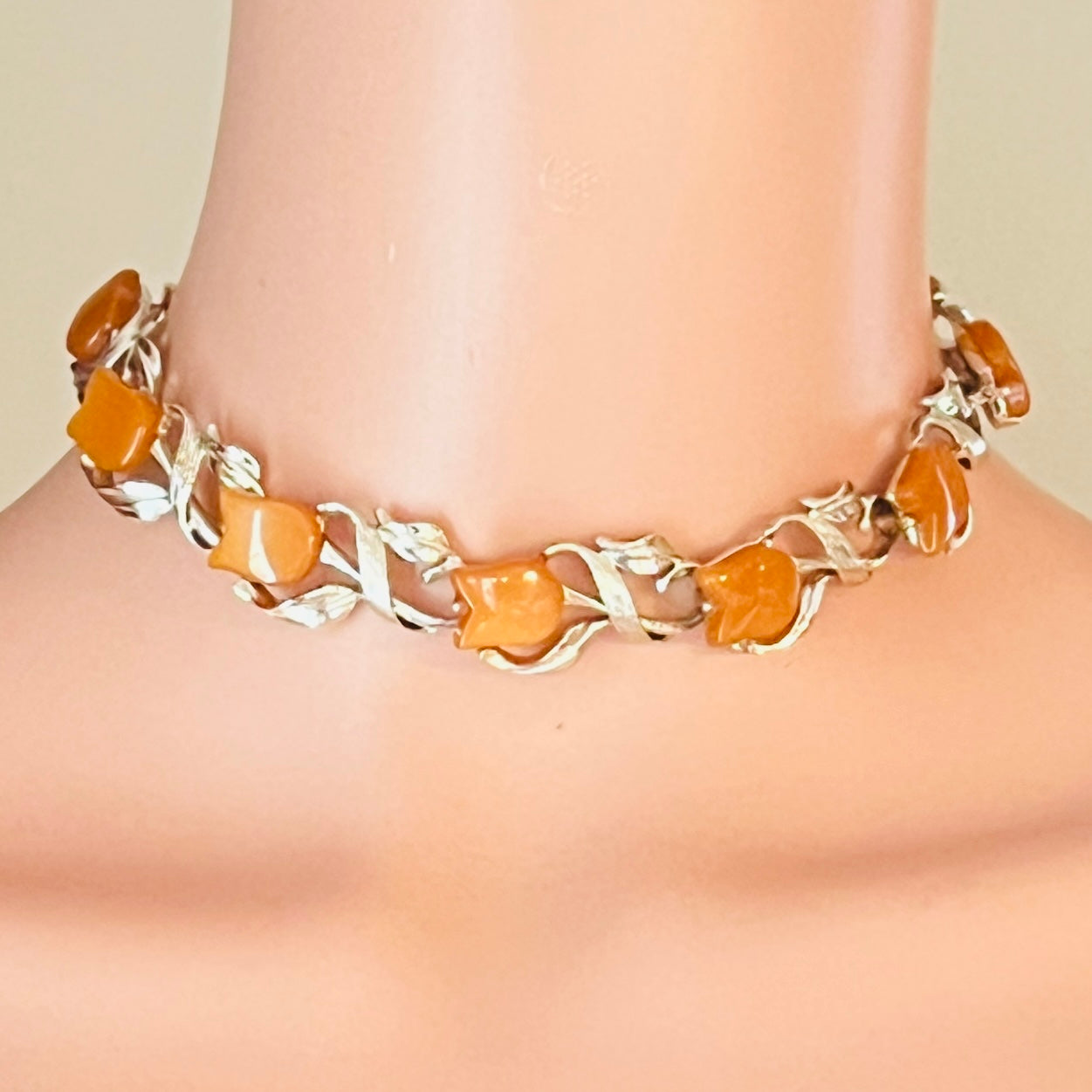Vintage 1950s thermoset lucite floral choker worn on mannequin