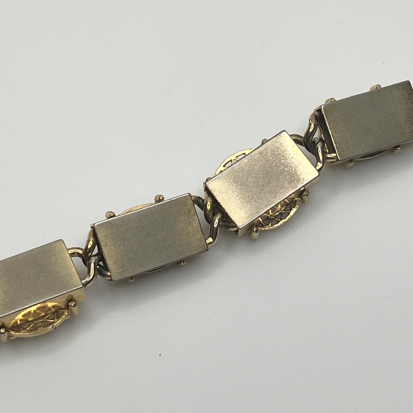 Gold Victorian revival panel bracelet with mother-of-pearl and faux pearls