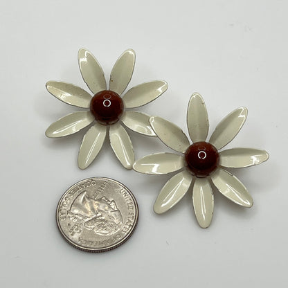 Clip-on enamel daisy earrings with white petals and brown centers