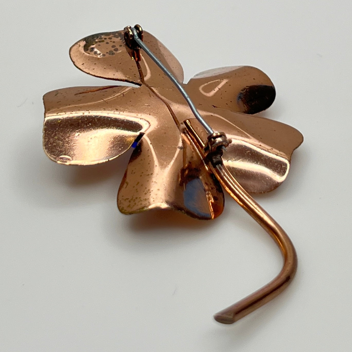 Angled view of backside highlighting wear consistent with age