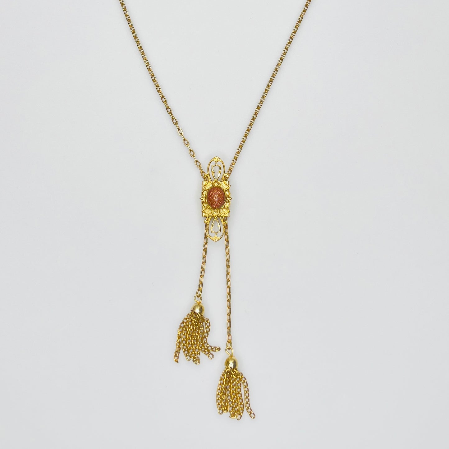 1970s goldstone lariat tassel necklace in gold tone