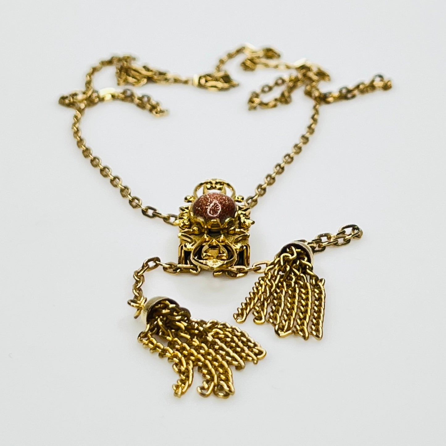 Vintage long gold tone necklace with adjustable slide pendant