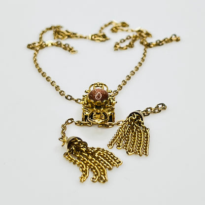 Vintage long gold tone necklace with adjustable slide pendant