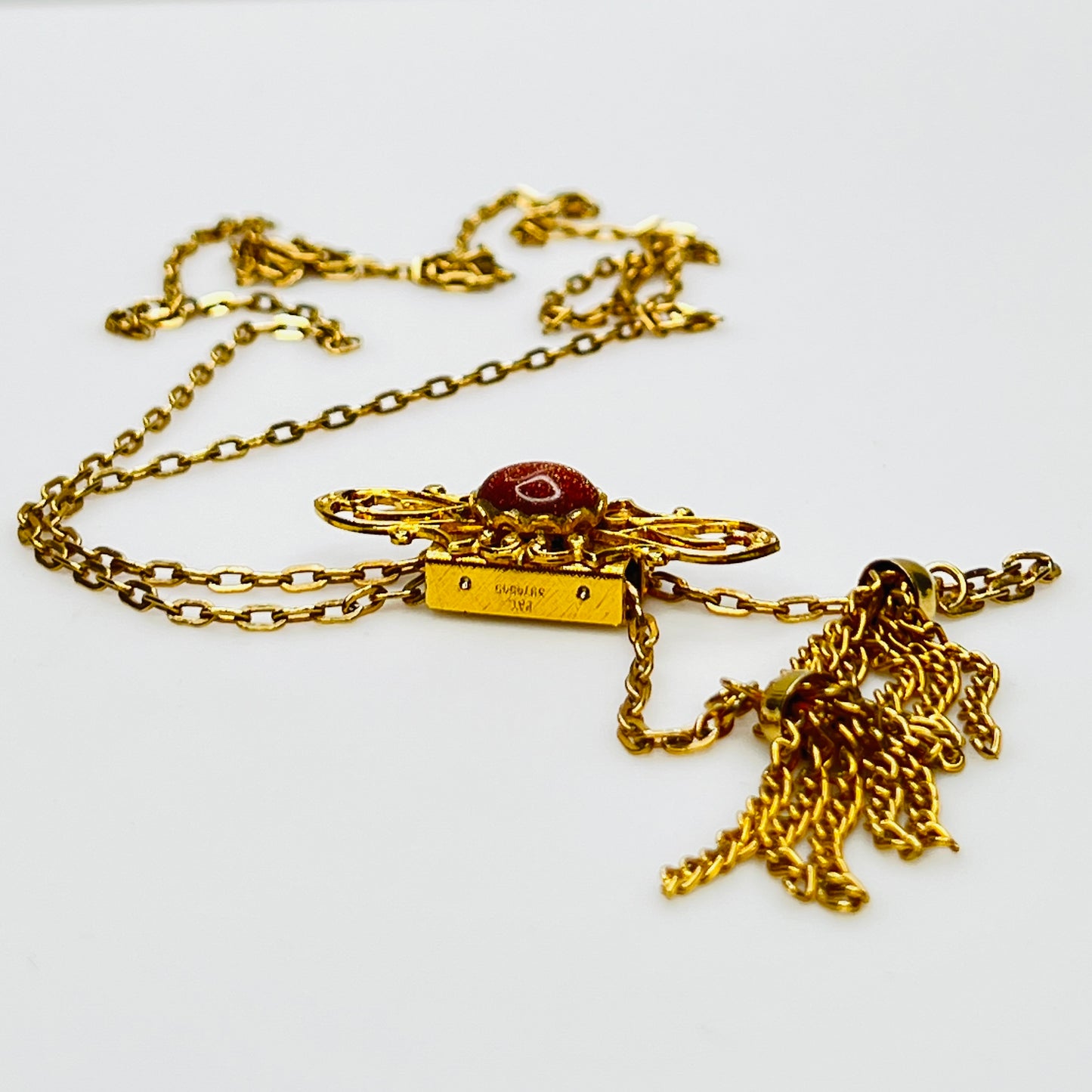 1970s goldstone lariat tassel necklace in gold tone