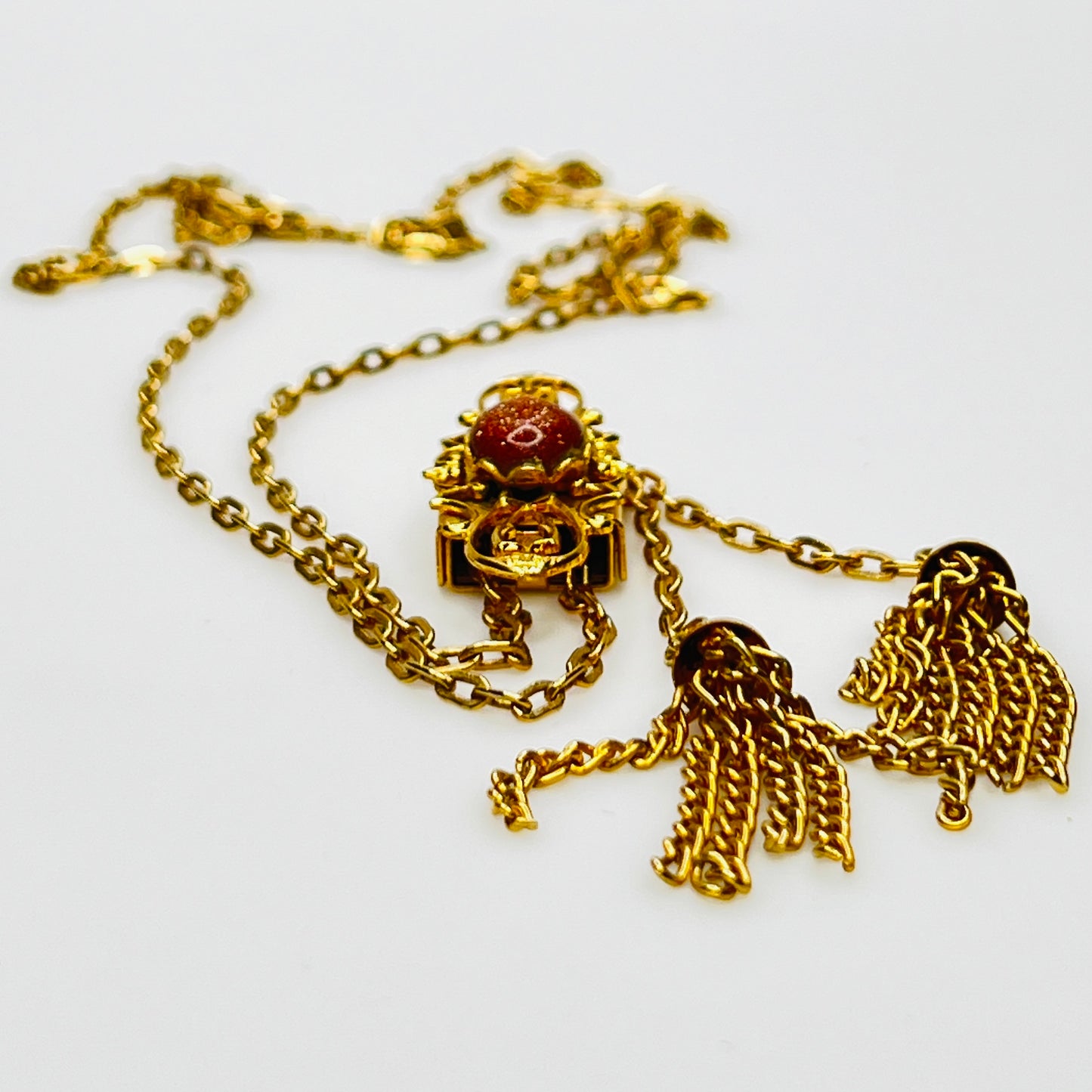 1970s goldstone lariat tassel necklace in gold tone