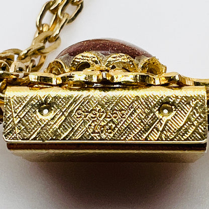 Patent stamped 3974545 gold tone slide detail