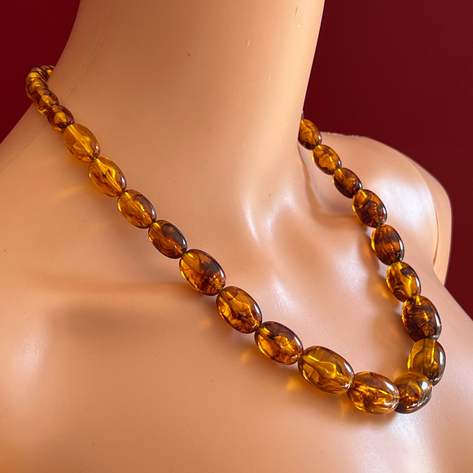 Vintage mid-century graduated bead necklace in amber Lucite