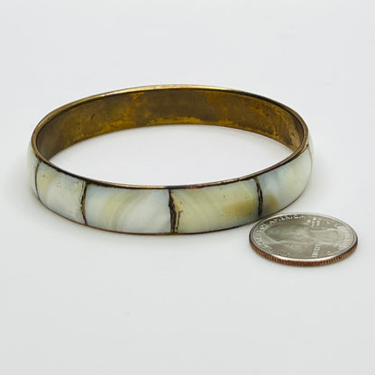 Boho vintage bangle with natural shell inlay, laid flat