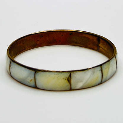 Boho vintage bangle with natural shell inlay, laid flat