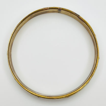 Boho vintage bangle with natural shell inlay, laid flat