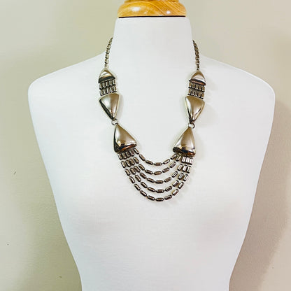 Vintage 1970s stainless steel geometric statement necklace with draped chain bib