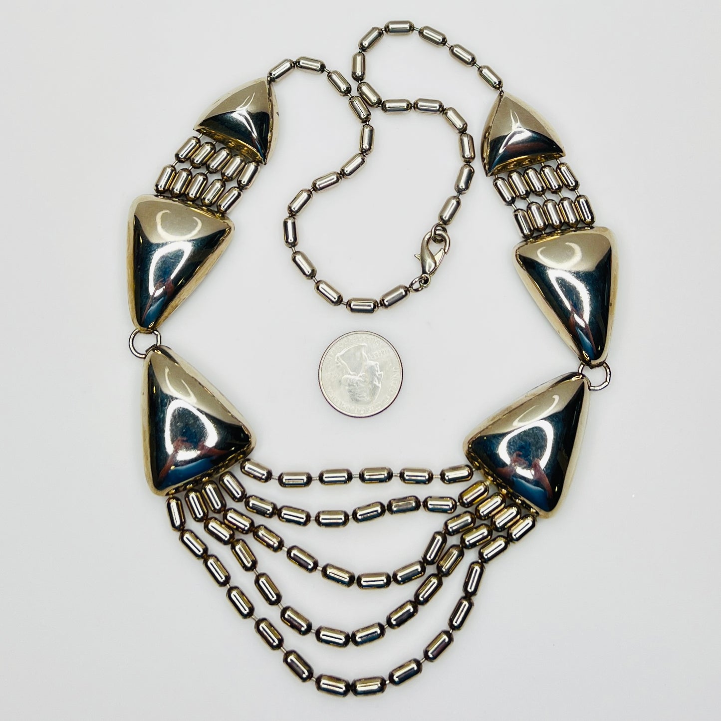 Vintage 1970s stainless steel geometric statement necklace with draped chain bib