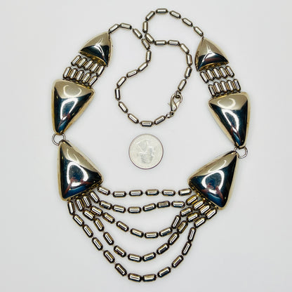 Vintage 1970s stainless steel geometric statement necklace with draped chain bib