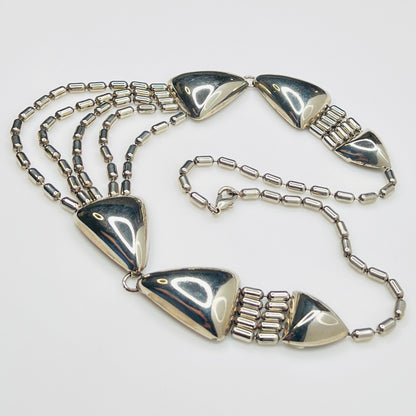 1970s silver tone geometric necklace with triangular links and cascading chains