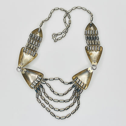 Back view of vintage stainless steel bib necklace with lobster clasp and chain drape