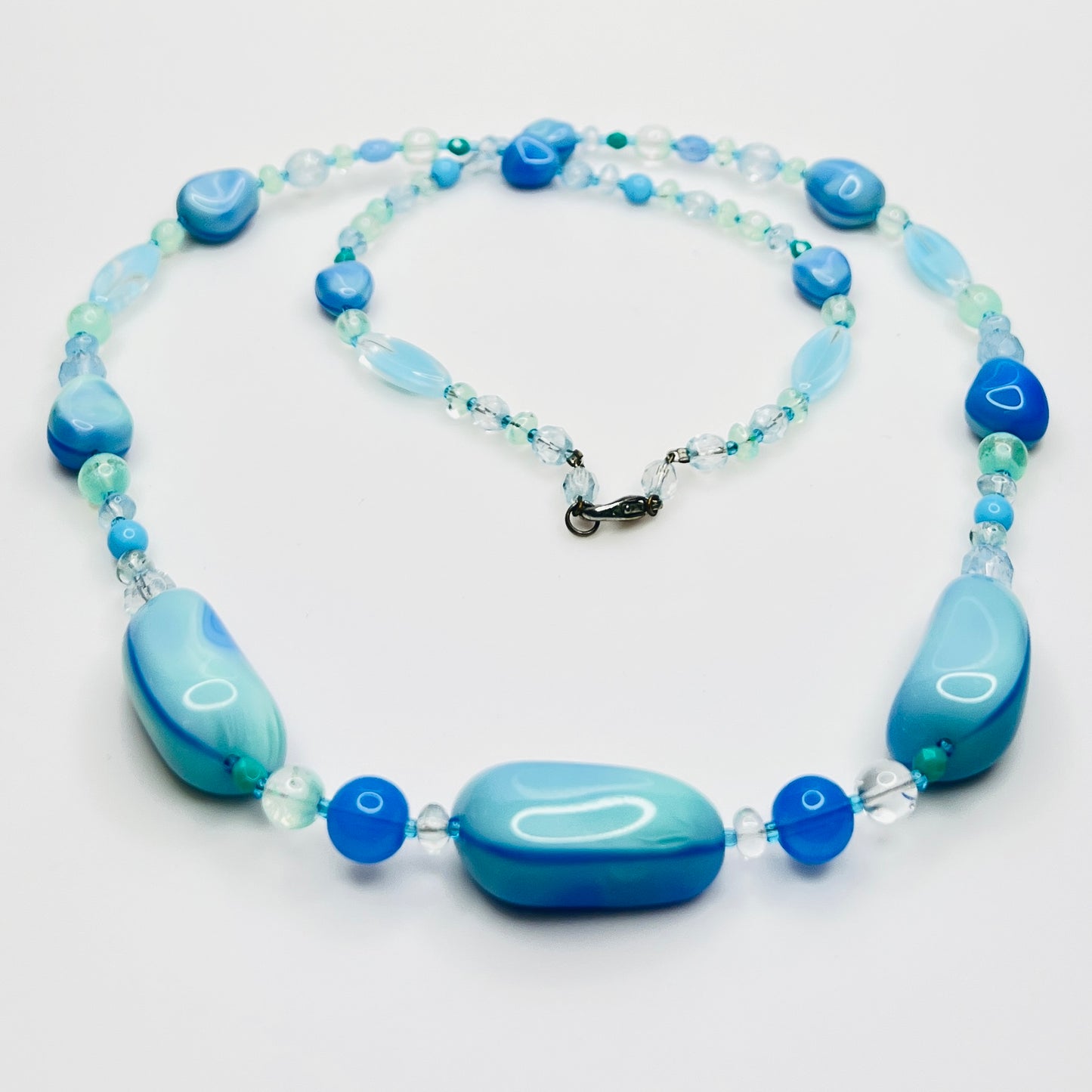 Blue green glass bead necklace with silver tone clasp, 31 inches