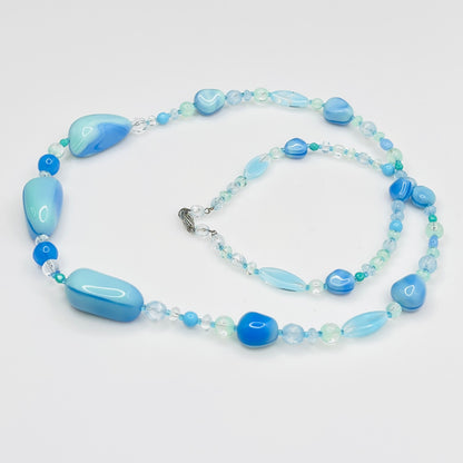 Blue green glass bead necklace with silver tone clasp, 31 inches