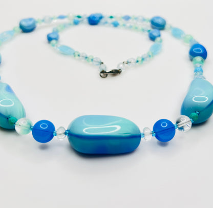 Close-up of aqua and turquoise art glass beads, 1980s necklace