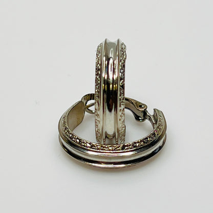 3/4 inch silver-tone hoops with etched detailing