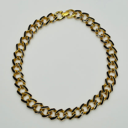 1980s gold-tone chain necklace with brown enamel links and hinge clasp, collar length.