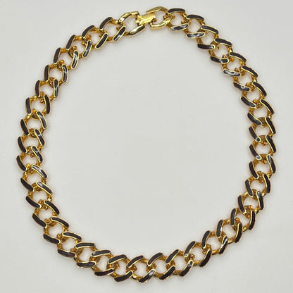 1980s gold-tone chain necklace with brown enamel links and hinge clasp, collar length.