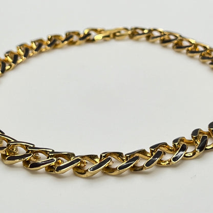 1980s gold-tone chain necklace with brown enamel links and hinge clasp, collar length.