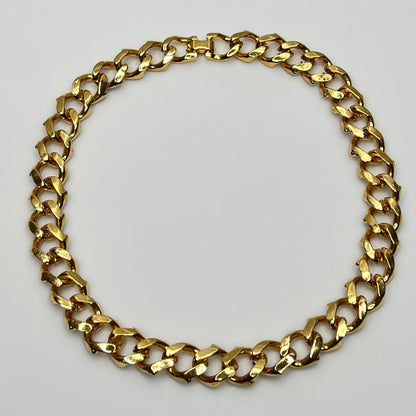 1980s gold-tone chain necklace with brown enamel links and hinge clasp, collar length.