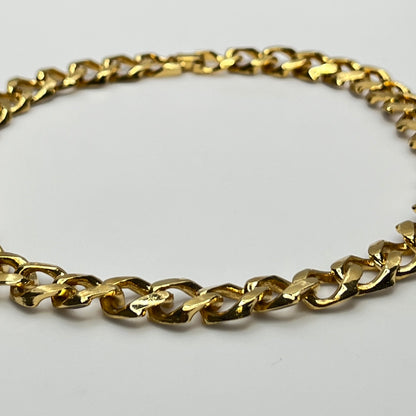 1980s gold-tone chain necklace with brown enamel links and hinge clasp, collar length.