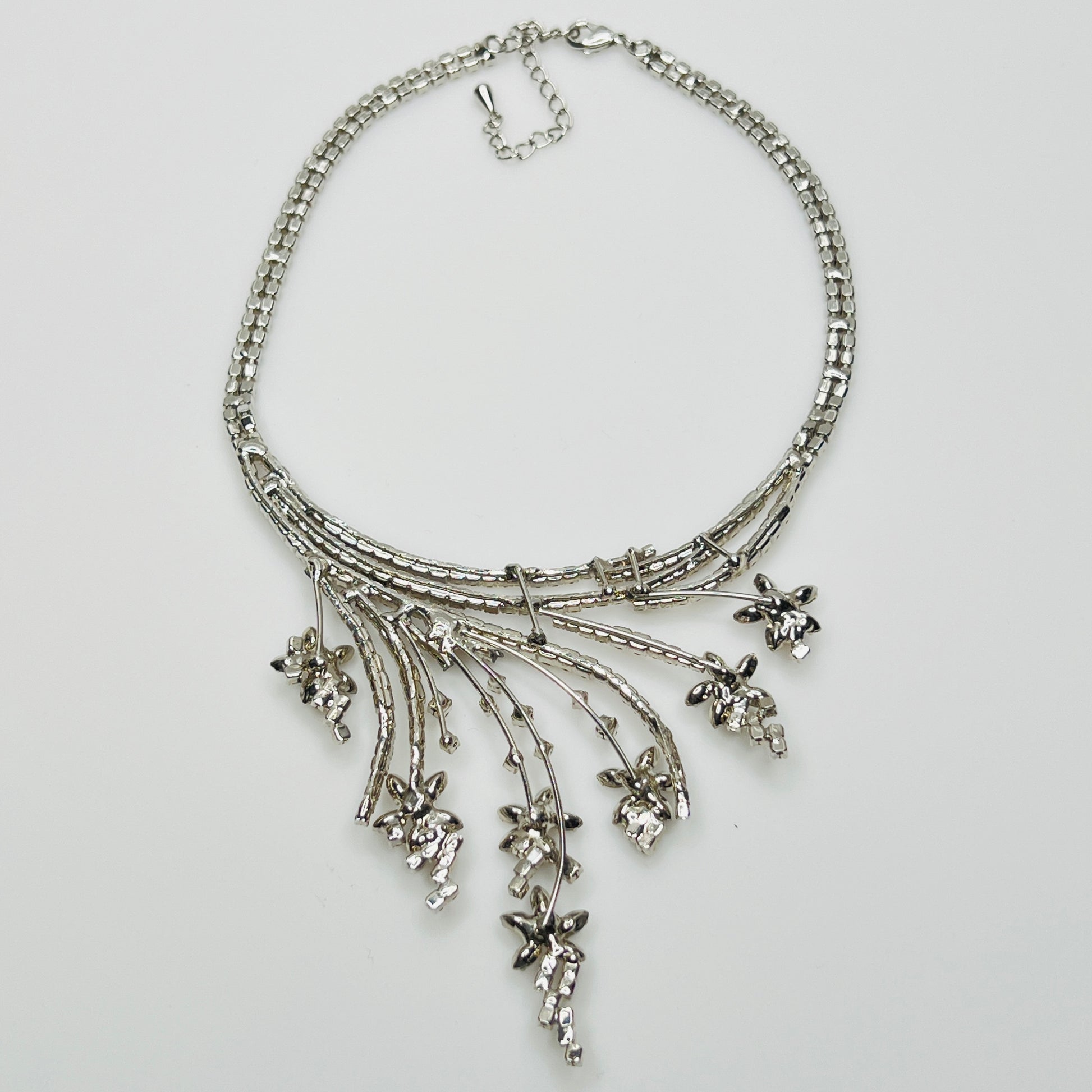 Mid-century floral rhinestone necklace in silvertone with prong-set stones