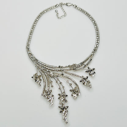 Mid-century floral rhinestone necklace in silvertone with prong-set stones
