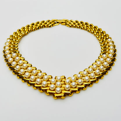 V-shaped gold-tone choker necklace with faux pearls in stacked link design