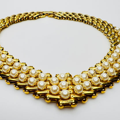 V-shaped gold-tone choker necklace with faux pearls in stacked link design